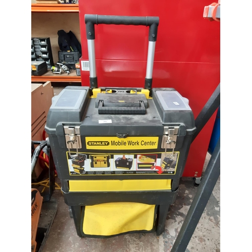 201 - A BLACK AND YELLOW STANLEY MOBILE WORK CENTRE