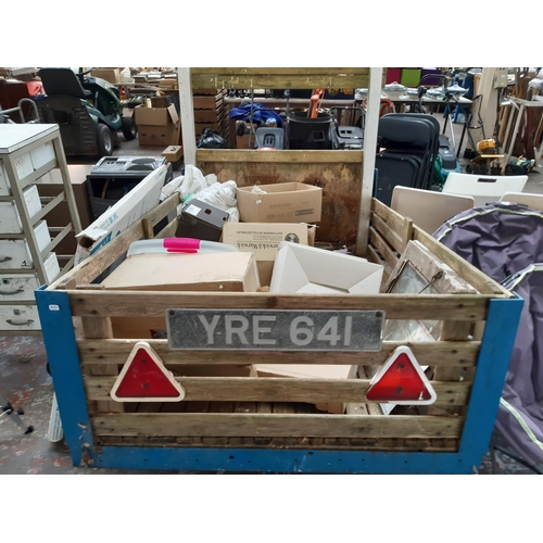 22 - A WOODEN SLATTED AND METAL TWO WHEEL CAR TRAILER - MEASURING APPROX. 5'6