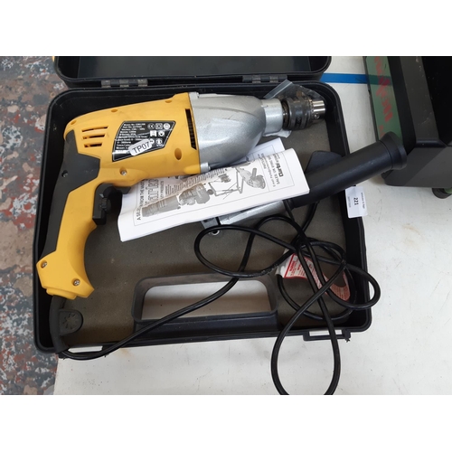 221 - A CASED CLARKE CONTRACTOR 120W MAINS ELECTRIC HAMMER DRILL