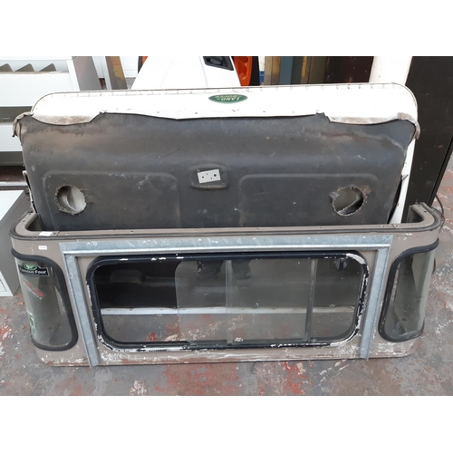 29 - THREE CLASSIC LAND ROVER SPARE PARTS TO INCLUDE ROOF WITH HEADLINING AND REAR WINDOW PANEL WITH SLID... 