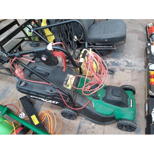 293 - A BLACK AND GREEN QUALCAST ELECTRIC LAWN MOWER WITH GRASS COLLECTOR