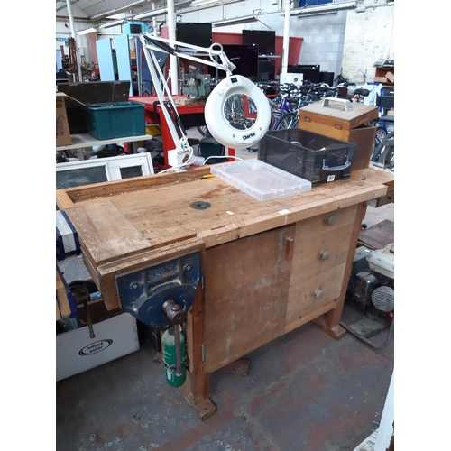 306 - A WOODEN WORKBENCH WITH MOUNTED RECORD 9