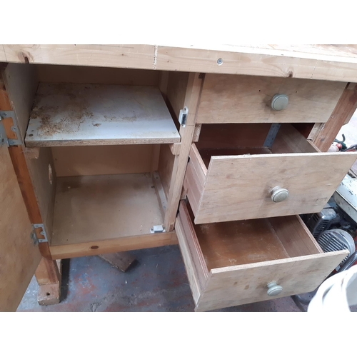 306 - A WOODEN WORKBENCH WITH MOUNTED RECORD 9