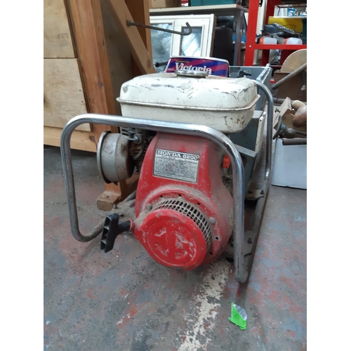 307 - A RED HONDA G200 PETROL GENERATOR