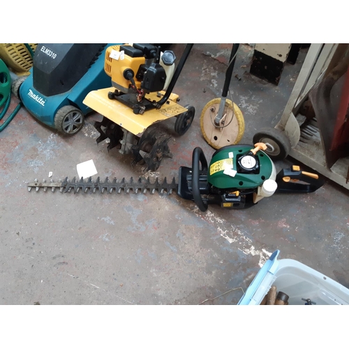 310 - A BLACK AND GREEN B&Q TRY26PHTA PETROL HEDGE TRIMMER WITH 27