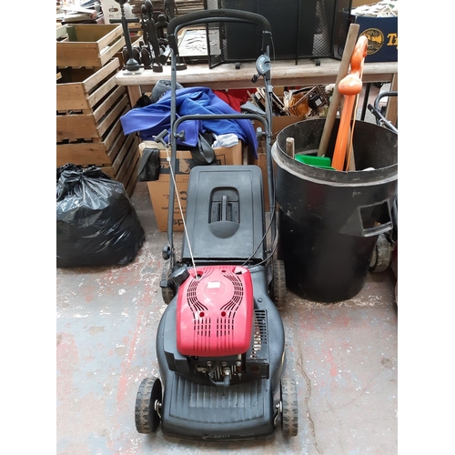 317 - A BLACK AND RED MOUNTFIELD HP474 PETROL LAWN MOWER WITH GRASS COLLECTOR