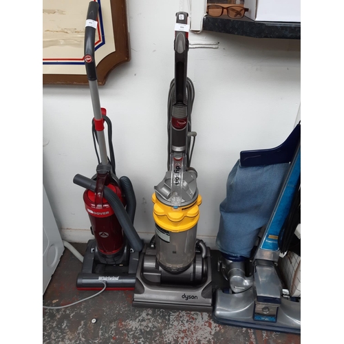 320 - A GREY AND YELLOW DYSON DC24 UPRIGHT BAGLESS VACUUM CLEANER