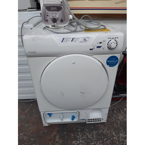 323 - A CANDY GRAND COMFORT GCC590NB 9KG CONDENSER DRYER