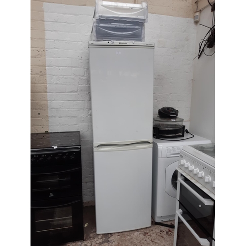 331 - A HOTPOINT ICED DIAMOND FFA52 UPRIGHT FRIDGE FREEZER