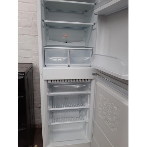 331 - A HOTPOINT ICED DIAMOND FFA52 UPRIGHT FRIDGE FREEZER