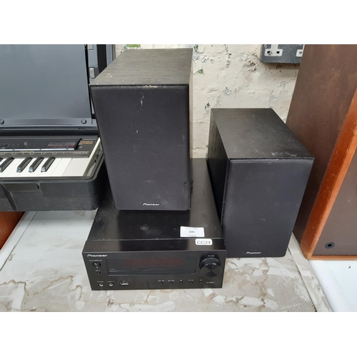 335 - A PIONEER X-HM11 MINI CD SYSTEM WITH TWO MATCHING SPEAKERS