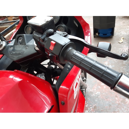 29 - A RED, SILVER AND BLACK 1988 KAWASAKI GPZ900R 908CC DOHC 16-VALVE SPORTS MOTORCYCLE, 24209 MILES, M.... 