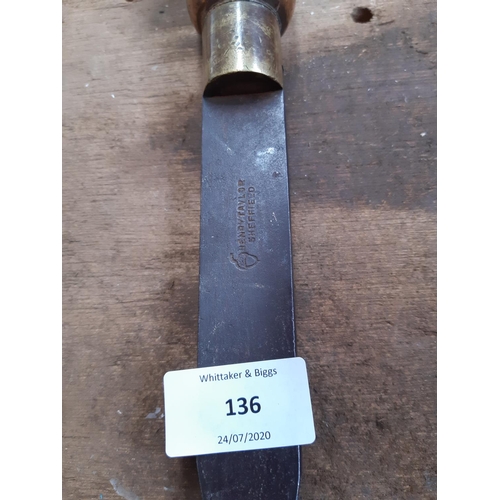 136 - A VINTAGE HENRY TAYLOR WOOD AND BRASS HANDLED SCREWDRIVER