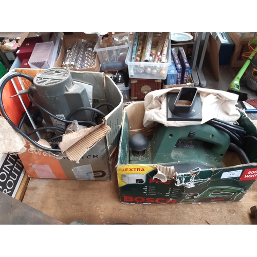 138 - TWO BOXED POWER TOOLS TO INCLUDE A GREEN BOSCH PH01 PLANER AND A PERFORMANCE POWER PP1020R ROUTER
