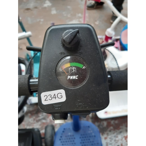 15 - A BLACK AND BLUE SHOPRIDER THREE-WHEELED MOBILITY SCOOTER WITH BATTERY