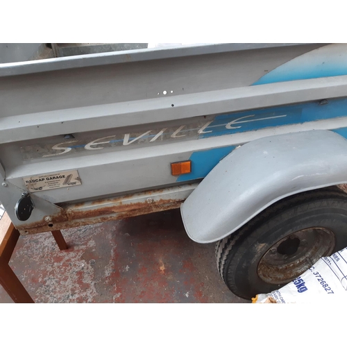 44 - A GALVANISED SEVILLE TWO-WHEELED TIPPING CAR TRAILER - MEASURING APPROX. 5' X 4' X 18