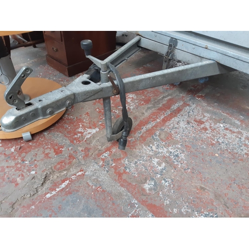 44 - A GALVANISED SEVILLE TWO-WHEELED TIPPING CAR TRAILER - MEASURING APPROX. 5' X 4' X 18