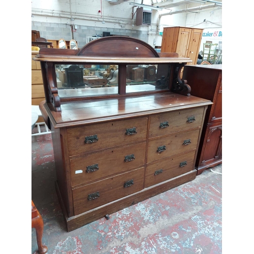 923 - AN EDWARDIAN MAHOGANY MIRRORED BACK SIDEBOARD WITH SIX LONG DRAWERS