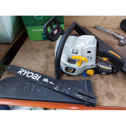 63 - A BLACK AND GREY RYOBI PCN4545 PETROL CHAINSAW WITH 18