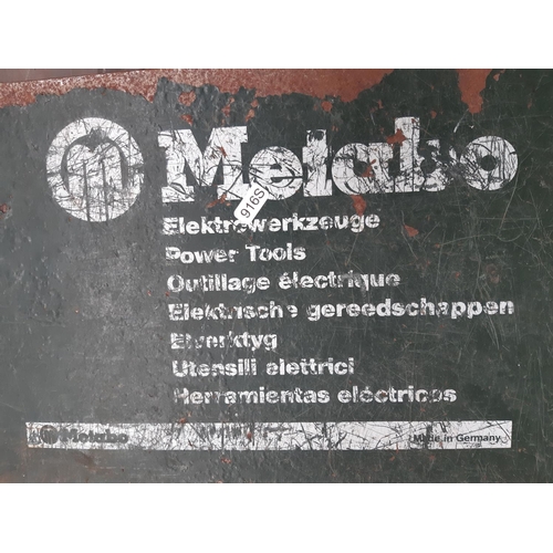 200 - A CASED GREEN AND BLACK METABO ELECTRIC JIGSAW