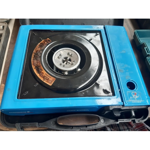 201 - A CASED CAMPING GAS STOVE