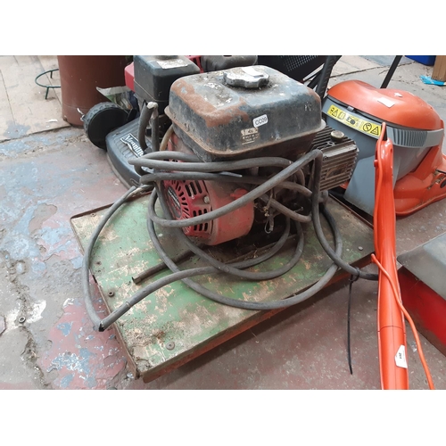 262 - A TROLLEY MOUNTED PETROL PRESSURE WASHER, WITH HONDA GX16C ENGINE