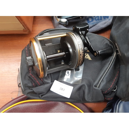 283 - A BAGGED DAIWA MILLIONAIRE TOURNAMENT FISHING REEL