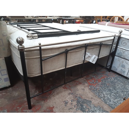 919 - AN IGEL PEGASUS GOLD AND WHITE DOUBLE MATTRESS WITH BLACK PAINTED WROUGHT IRON BED FRAME, FOOTBOARD ... 