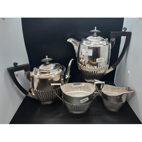 137 - An excellent quality hallmarked Sheffield silver Walker & Hall four piece tea and coffee set compris... 