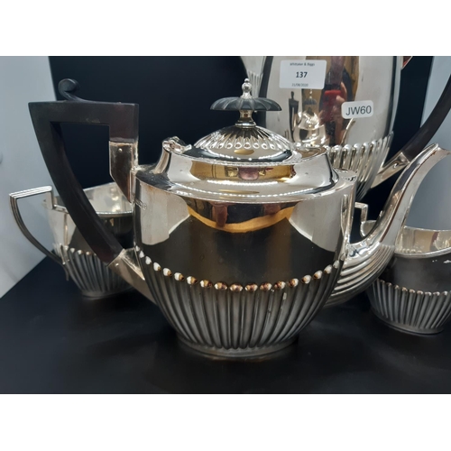 137 - An excellent quality hallmarked Sheffield silver Walker & Hall four piece tea and coffee set compris... 