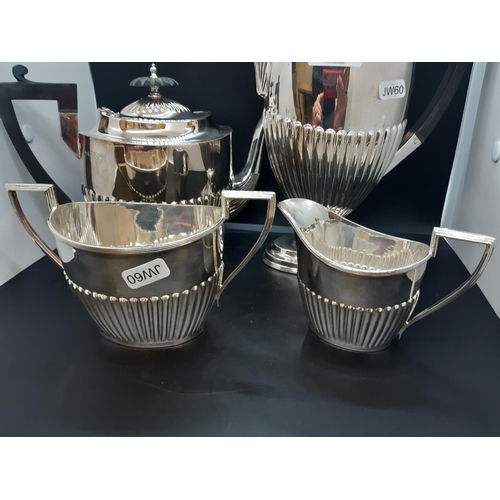 137 - An excellent quality hallmarked Sheffield silver Walker & Hall four piece tea and coffee set compris... 