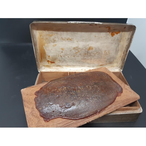 145 - A hallmarked Birmingham silver cigarette box with “EP” initials and engine turned top, dated 1937