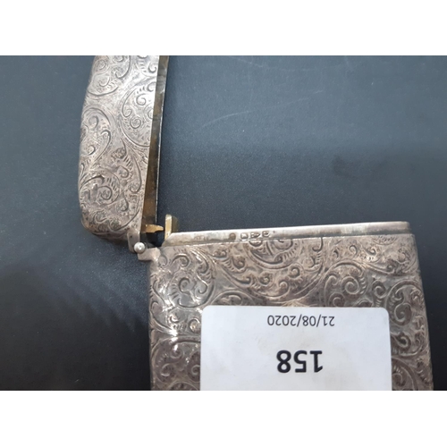 158 - A hallmarked Chester silver card case with elaborate etched design, dated 1886 - total approx. weigh... 