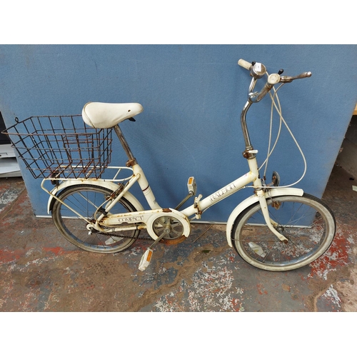 258 - A white Raleigh folding ladies shopping bike with 3 speed sturmey archer gear system