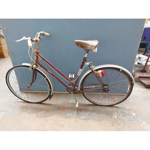 260 - Two vintage bicycles to include a purple Coventry Eagle ladies town bike with sprung saddle and 3 sp... 