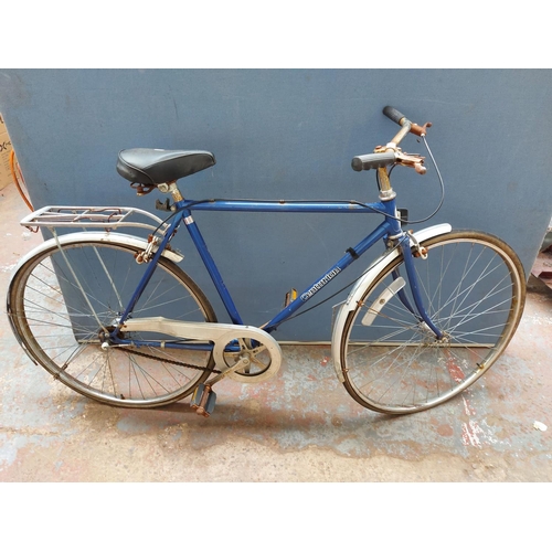 260 - Two vintage bicycles to include a purple Coventry Eagle ladies town bike with sprung saddle and 3 sp... 
