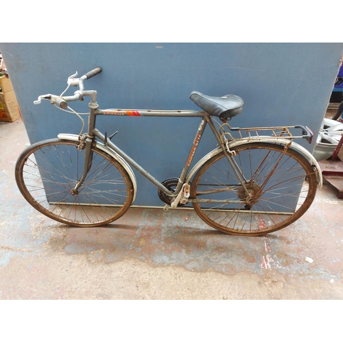 261 - A vintage grey Emmelle Ranger gents touring bike with rear carrier and 10 speed gear system