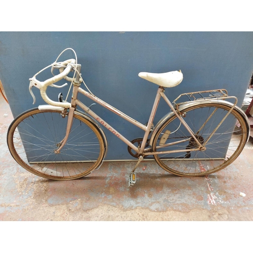 262 - A vintage pink Falcon Sorrento ladies town bike with rear carrier and 5 speed gear system
