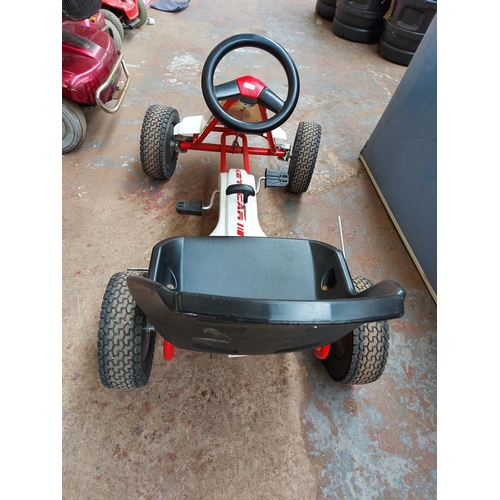 264 - A red and white Kettcar child's peddle go kart
