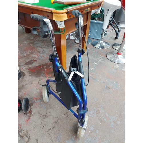 271 - A blue Wheeltech three wheeled walking aid with brakes