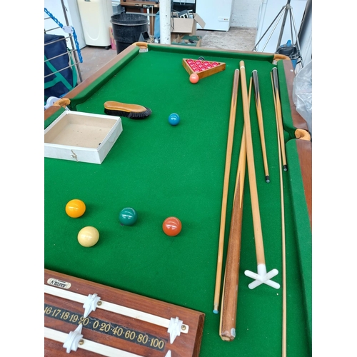 272 - A good quality vintage Raper 6 x 3 ft slate bed snooker table with heavy wooden base complete with b... 
