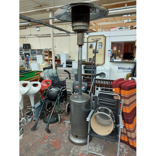 275 - A grey Palm Springs patio heater