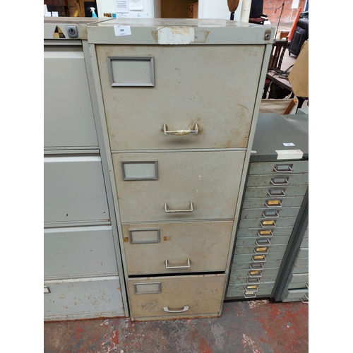 280 - A four drawer metal office filing cabinet