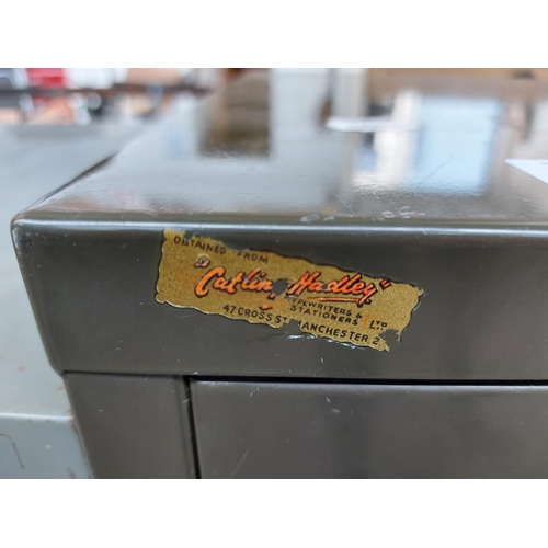 283 - A vintage green Catlin & Hadley of Manchester 9 drawer metal office filing cabinet