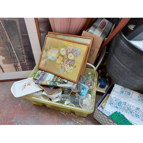 300 - A very large mixed clearance lot to include pictures, glassware, lampshades, clothing, suitcases etc... 