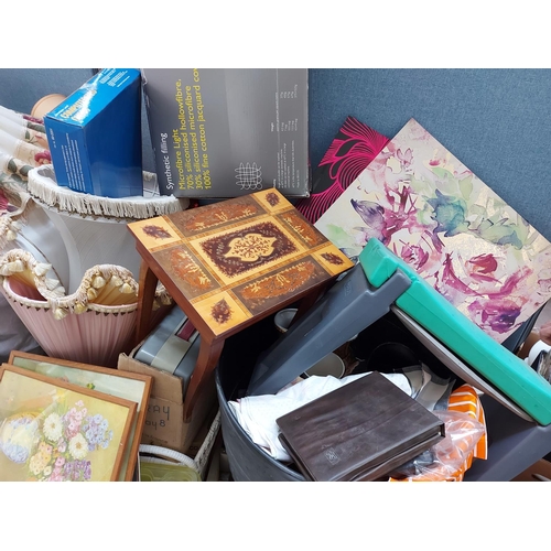 300 - A very large mixed clearance lot to include pictures, glassware, lampshades, clothing, suitcases etc... 