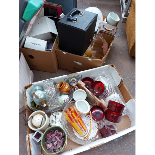 300 - A very large mixed clearance lot to include pictures, glassware, lampshades, clothing, suitcases etc... 