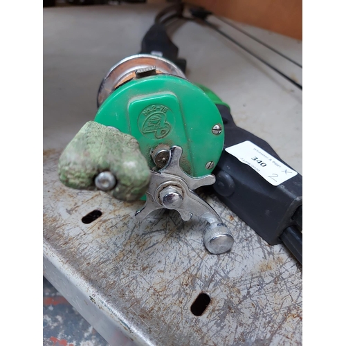 340 - Two items to include an Angler D No. 2-75 sea fishing reel together with a Barnett Banshee quad comp... 