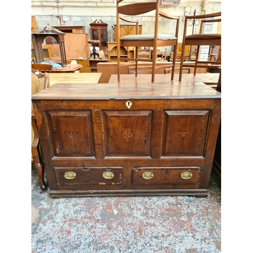 237 - A Georgian inlaid oak mule chest with two lower drawers, brass regency handles and bone estucheon