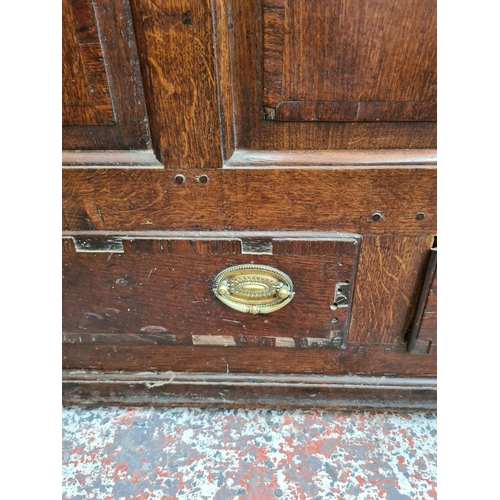237 - A Georgian inlaid oak mule chest with two lower drawers, brass regency handles and bone estucheon